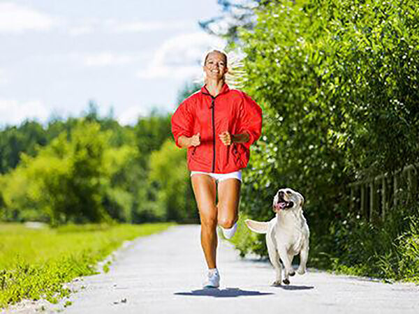 woman running with dog